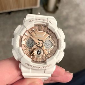 Women’s white and rose gold g shock watch